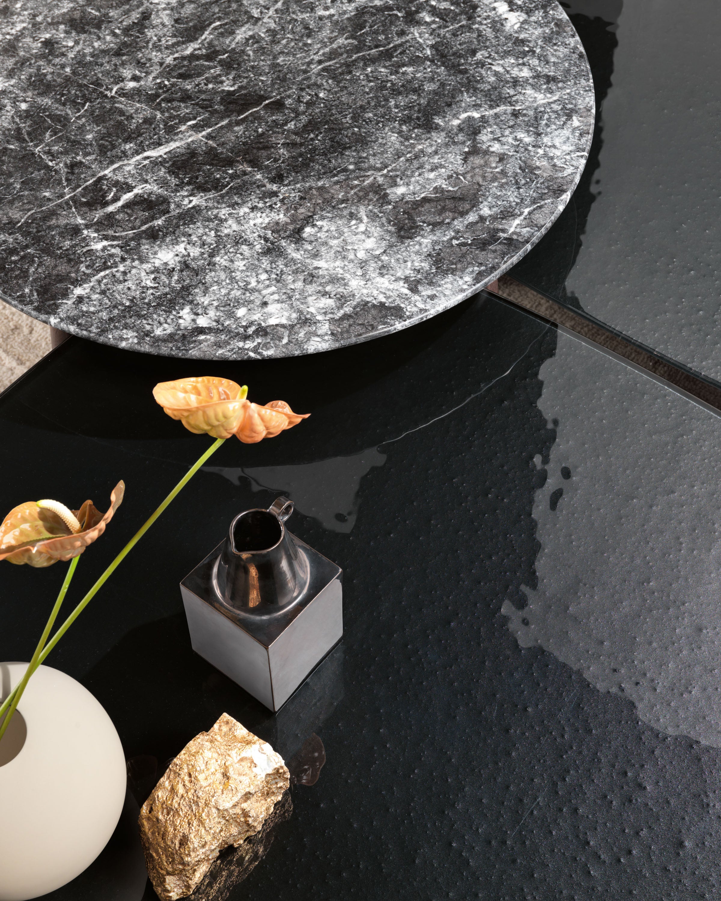 Magma Glass Coffee Table by FIAM Italia – fused glass top surface and matte black wood base.