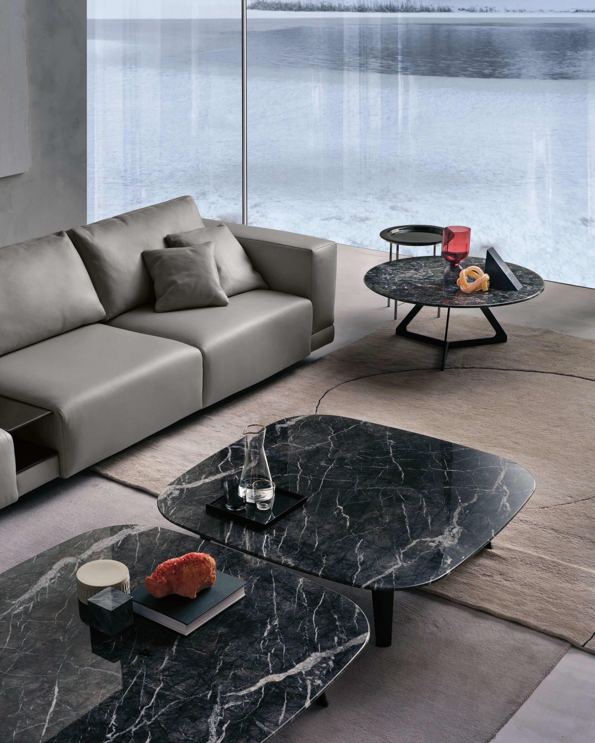 Magma Glass Coffee Table in a modern living room, complementing a neutral sofa and contemporary decor.