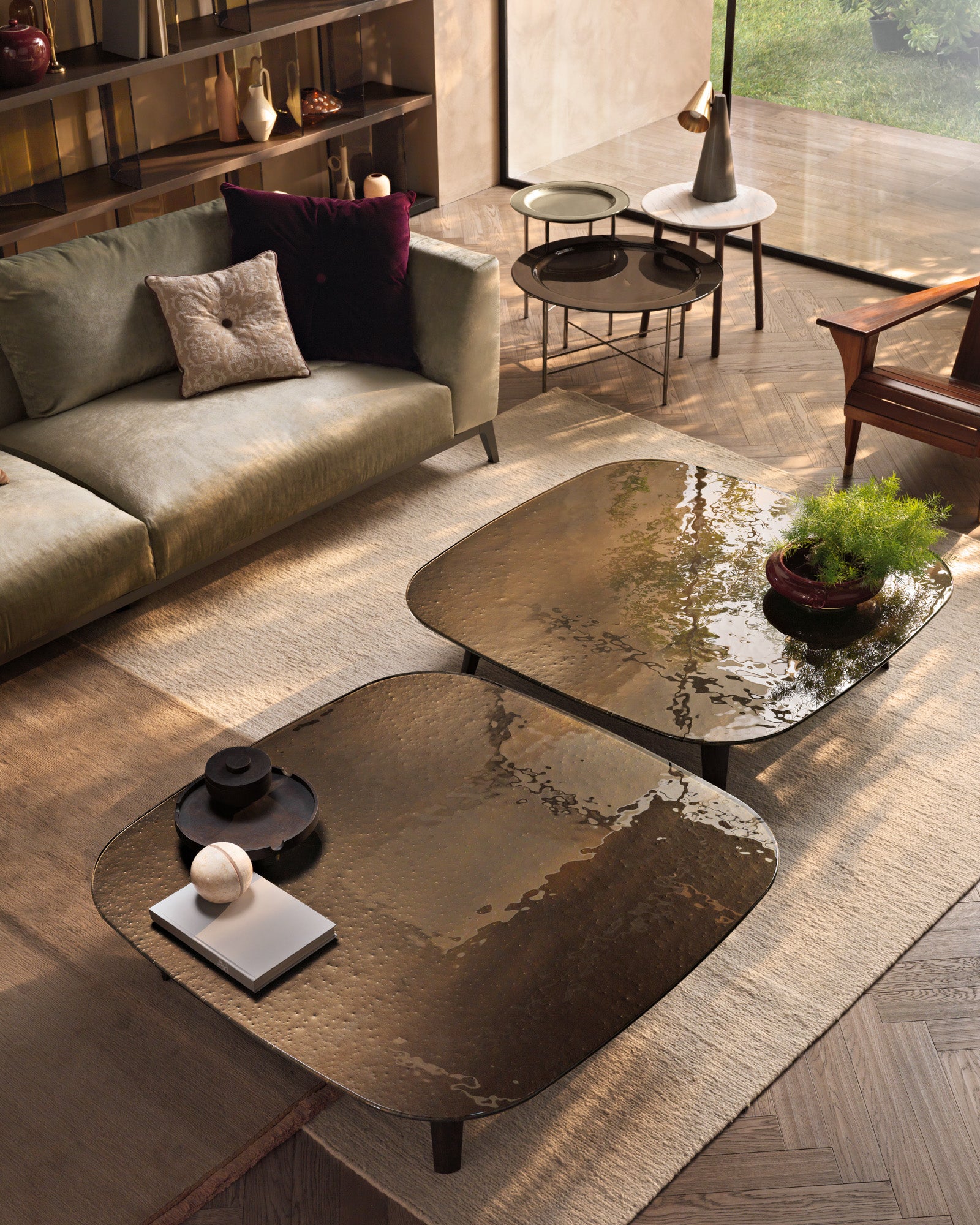 Magma Brown Glass Coffee Table in a modern living room, complementing a neutral sofa and contemporary decor