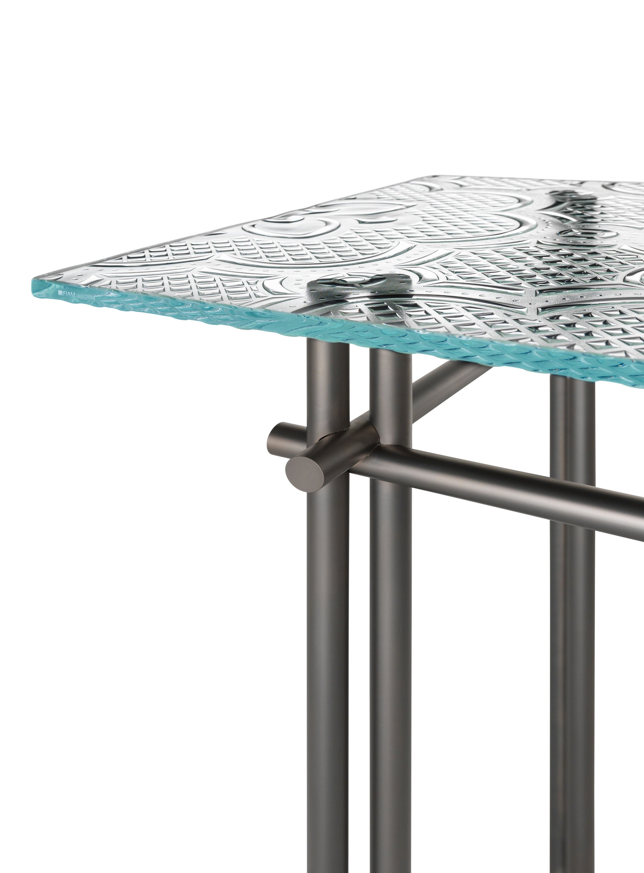 Cristaline console with a 15mm fused glass top and a opaque titanium metal base, blending luxury and simplicity
