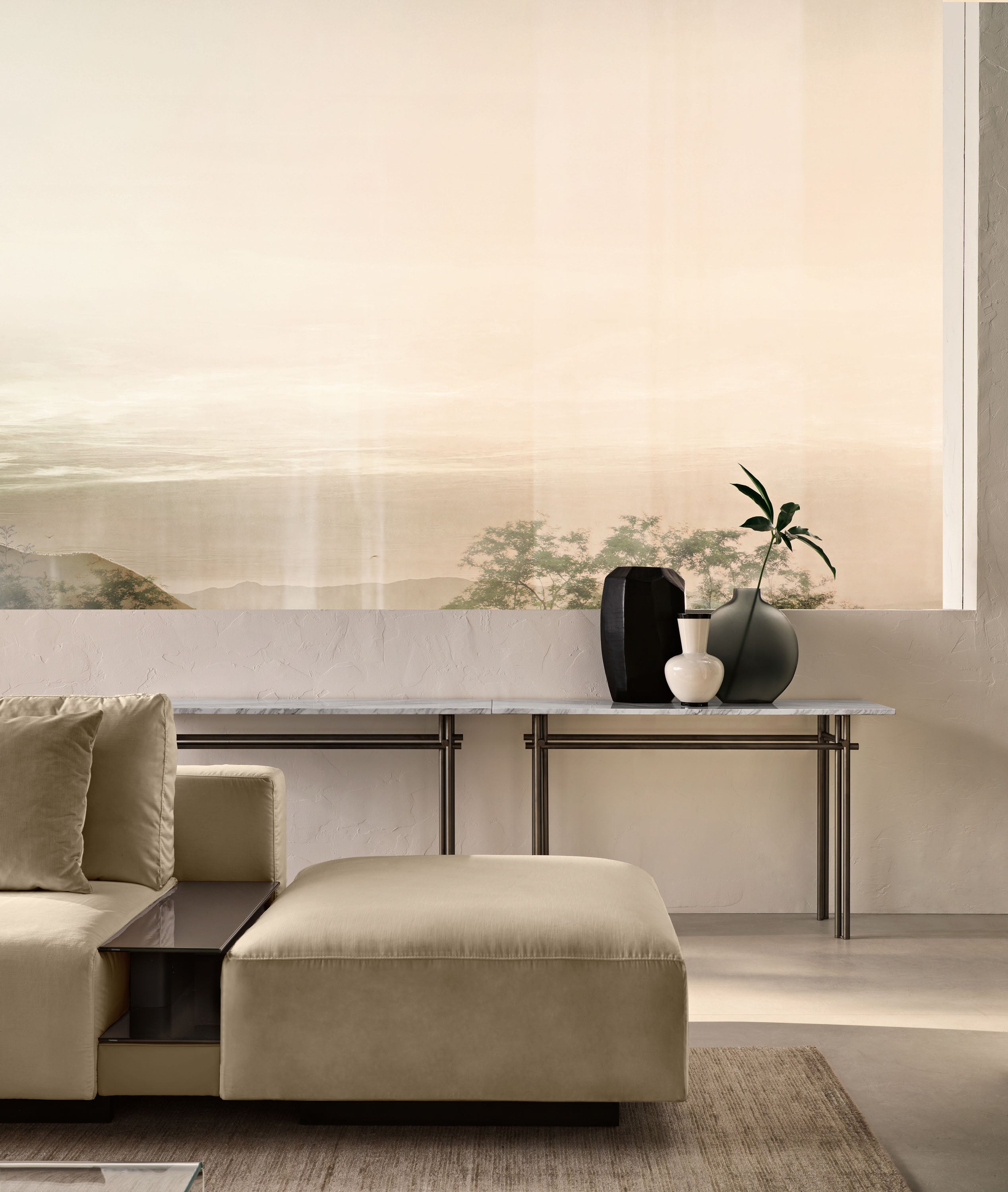 ristaline console with a 15mm Calacatta Royal marble top and a matte titanium metal base, blending luxury and simplicity.