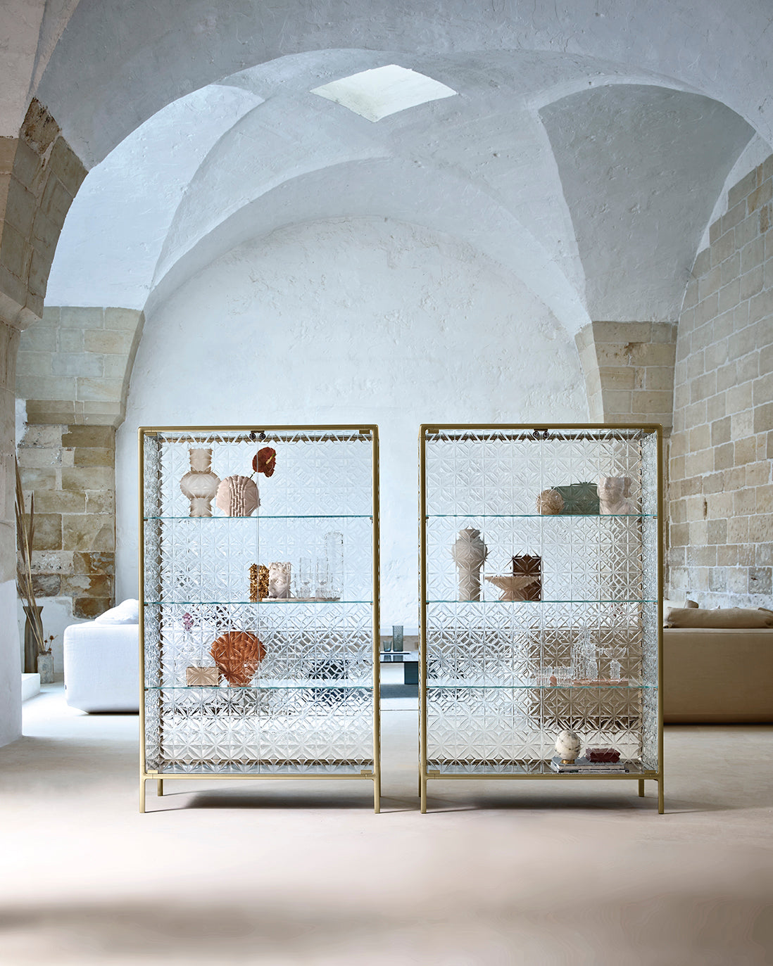 FIAM Echo glass showcase cabinet with extralight fused glass doors and champagne frame 