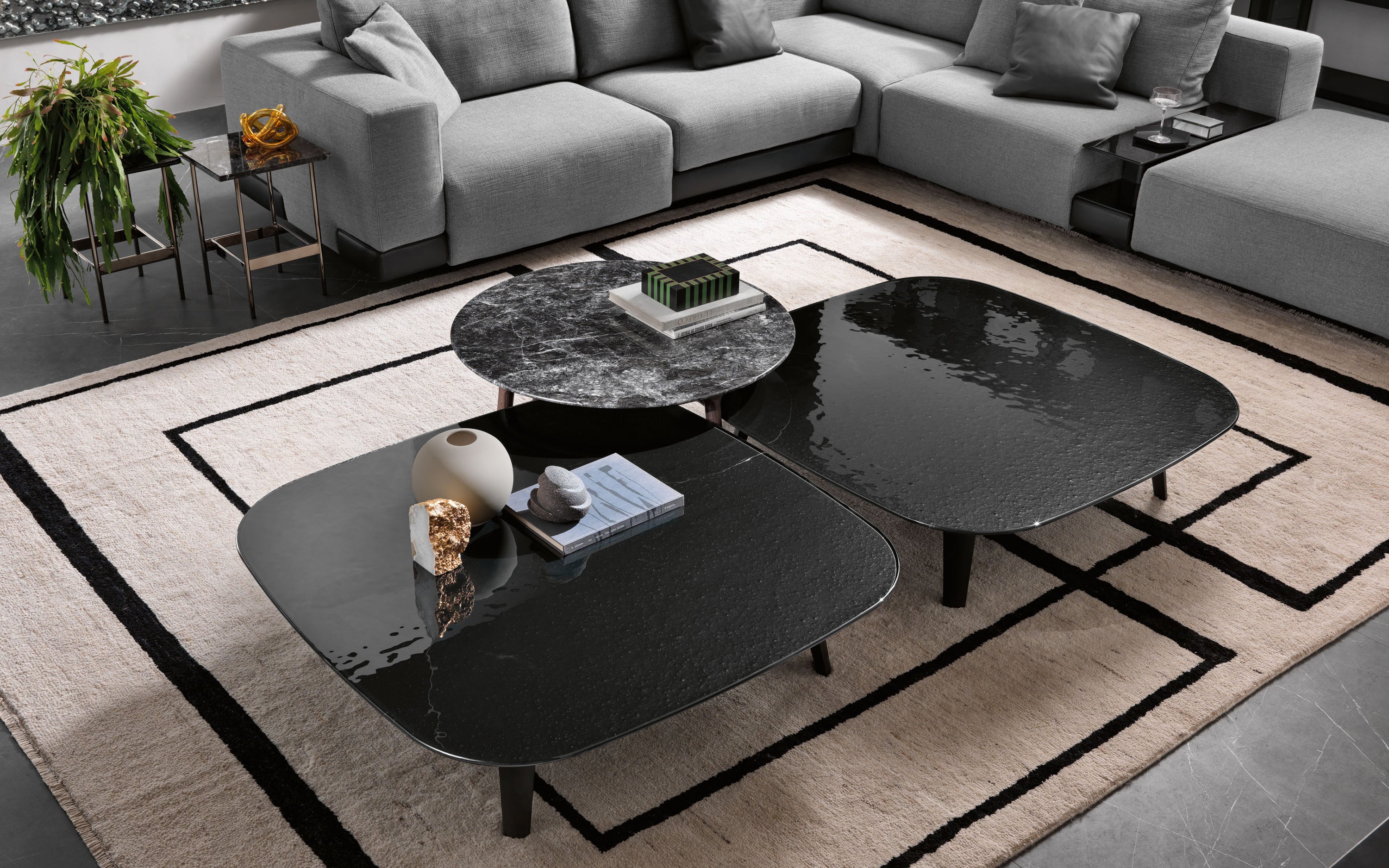 Magma Coffee Table by FIAM Italia styled in a cozy living space with warm lighting and complementary furnishings