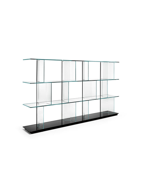 Fiam Inori modular glass bookcase in freestanding configuration, showcasing minimalist design with extraclear glass shelves, black glass base and extraclear glass uprights.