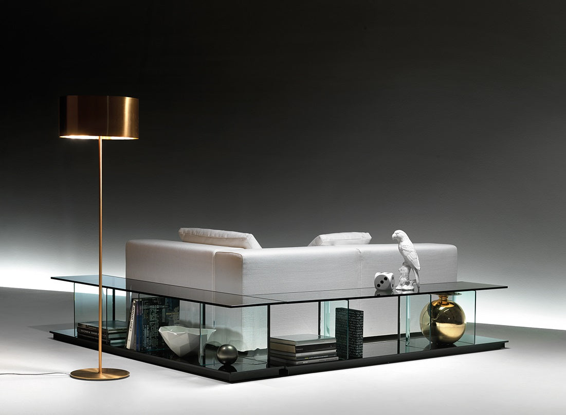 Fiam Inori modular bookcase integrated into a contemporary living room, serving as an L-shape sofa table.