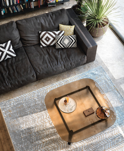 Magma Coffee Table by FIAM Italia styled in a cozy living space with warm lighting and complementary furnishings