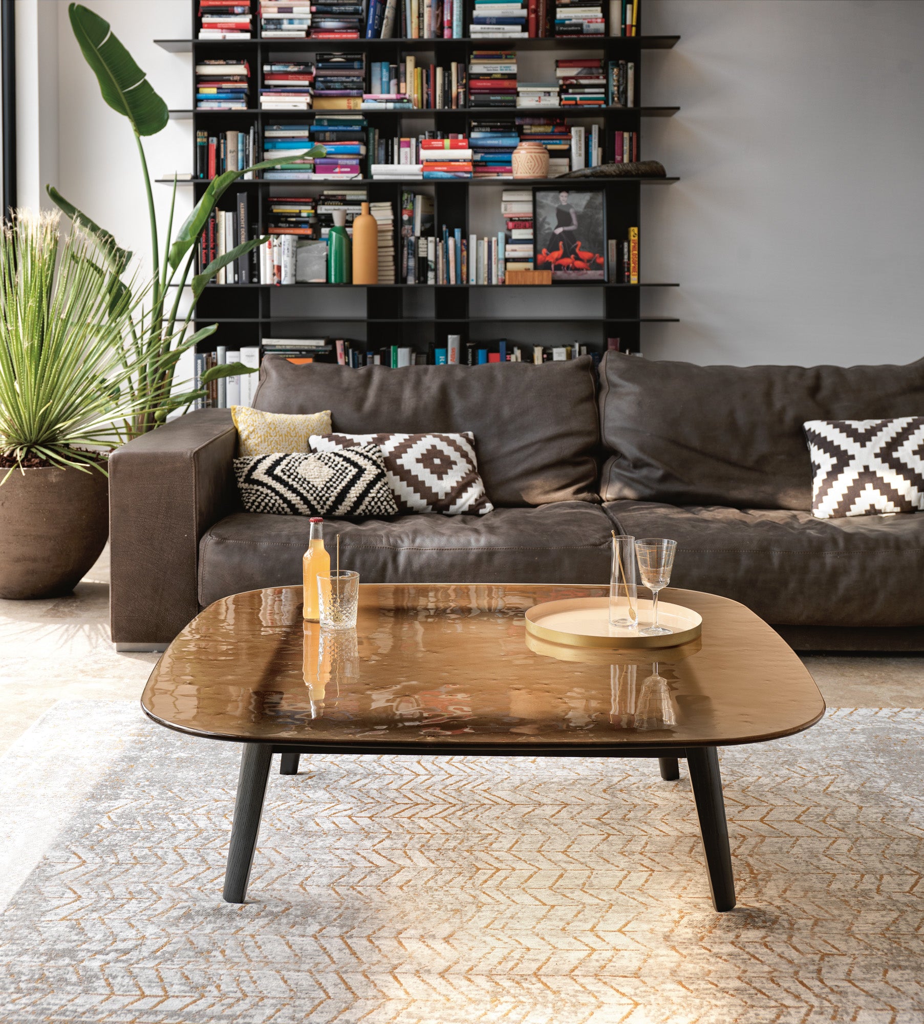 Magma Coffee Table by FIAM Italia styled in a cozy living space with warm lighting and complementary furnishings
