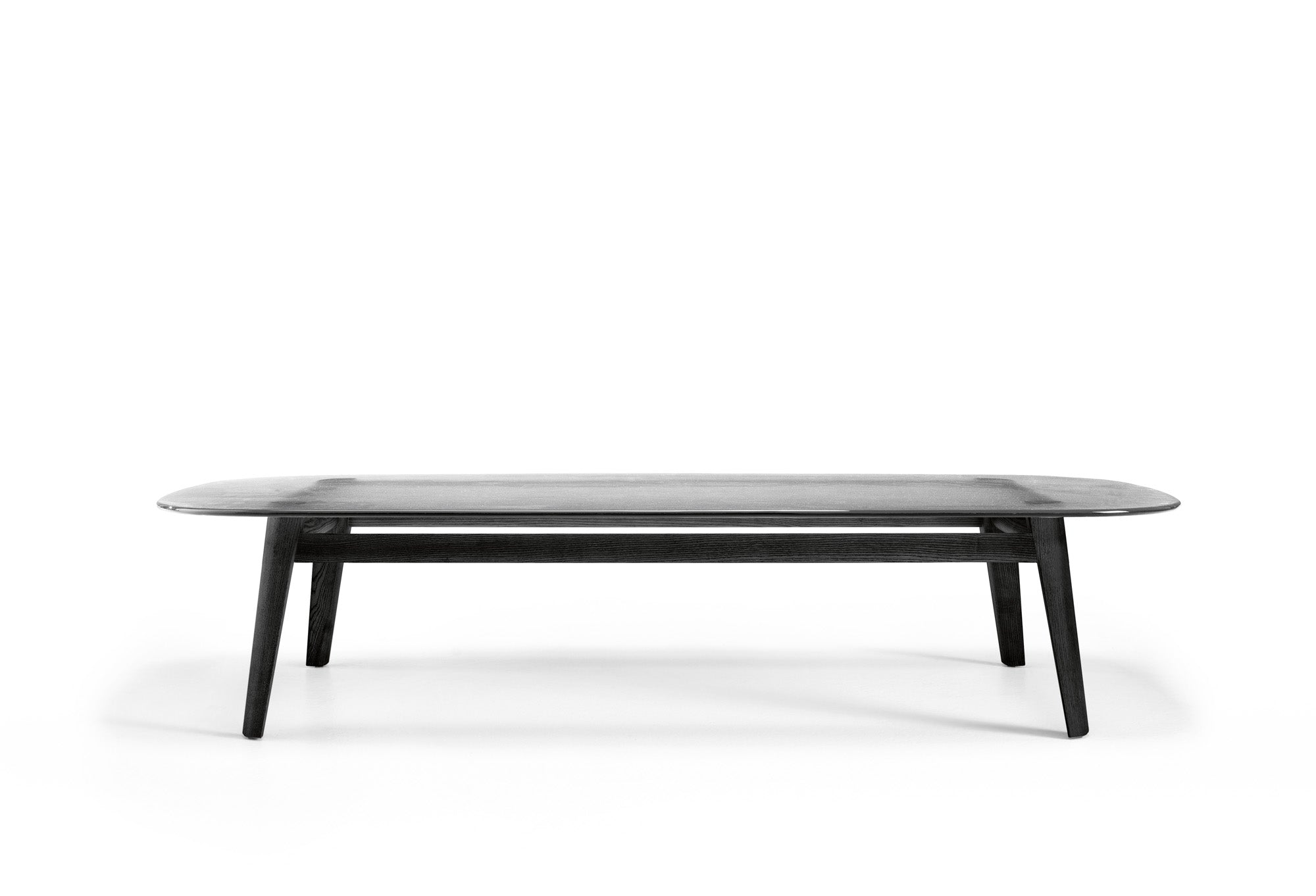 Magma Glass Coffee Table by FIAM Italia – Side angle showcasing sculpted fused glass surface and matte black wood base.