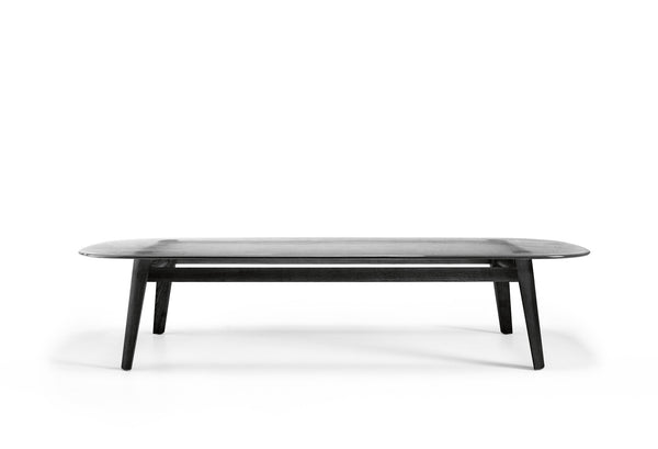Magma Glass Coffee Table by FIAM Italia – Side angle showcasing sculpted fused glass surface and matte black wood base.