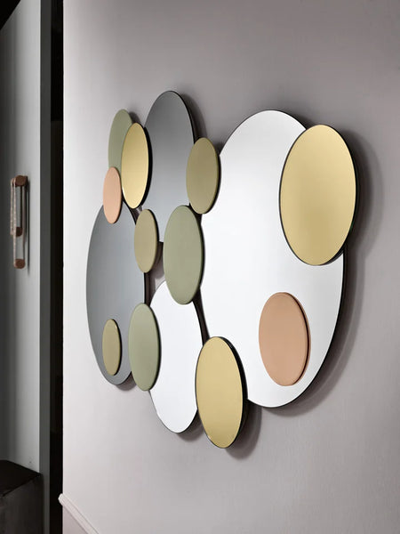 Assorted mirror and glass finishes over metal frame can be hung vertical or horizontal.