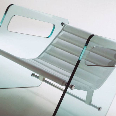 Minimalist glass armchair in extra-clear finish with matte white leather seat